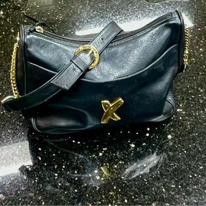 Picasso Paloma Black Leather Shoulder Bag with Gold accents.